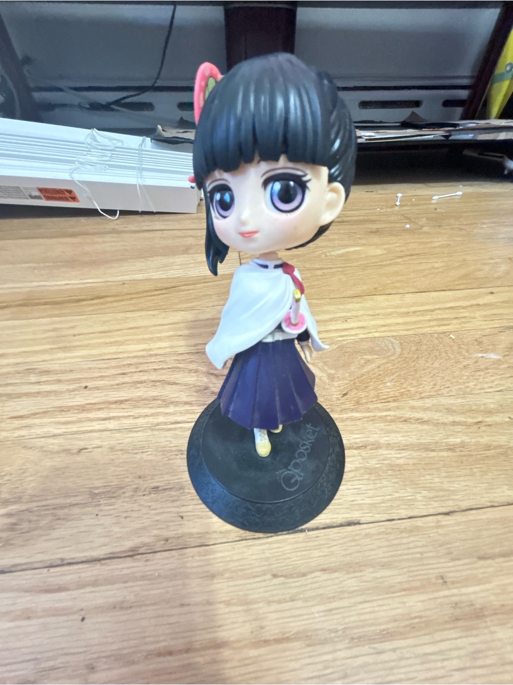 A female anime figurine from demon slayer